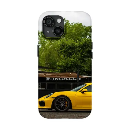 Yellow Porsche Cayman GT4 Street Parked