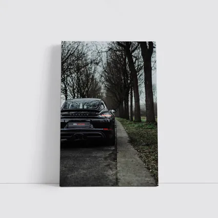 Black Porsche Cayman Rear View Moody Road