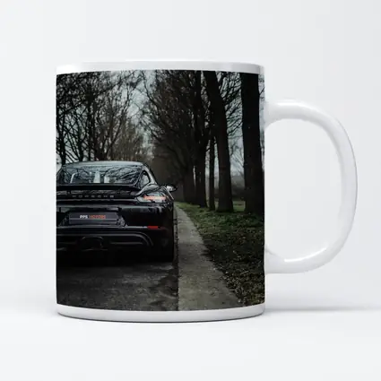 Black Porsche Cayman Rear View Moody Road