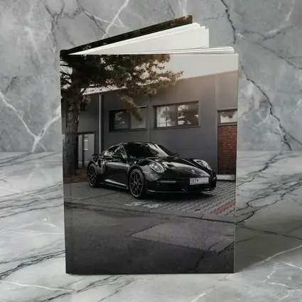 Black Porsche 911 Parked Urban Building