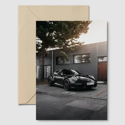 Black Porsche 911 Parked Urban Building