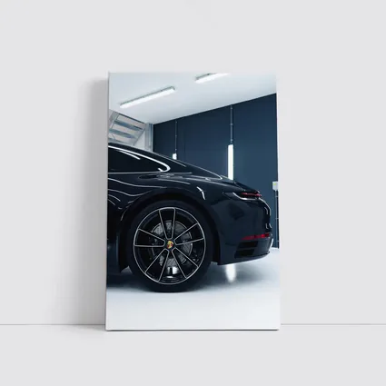 Black Porsche Panamera In Dark Garage