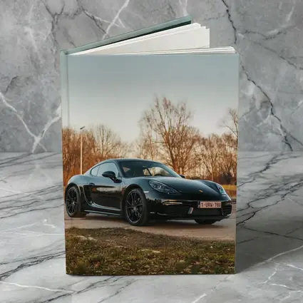 Black Porsche Cayman Parked Outdoors Autumn Trees
