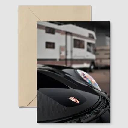 Porsche Black Hood Crest Close Up