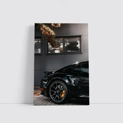 Black Porsche 911 Parked Near Building