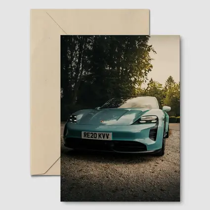 Porsche Taycan Teal Green Gravel Driveway