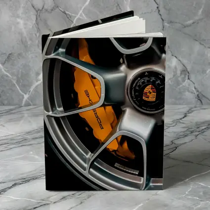 Porsche Orange Brake Caliper Silver Wheel