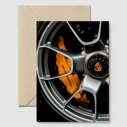 Porsche Orange Brake Caliper Silver Wheel