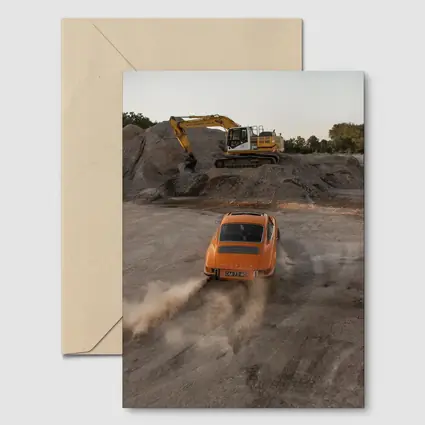 Orange Porsche 911 Drifting Dusty Gravel Quarry