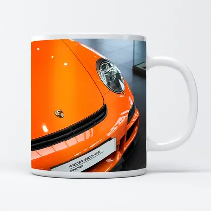Porsche 911 Orange Front Dealership Interior