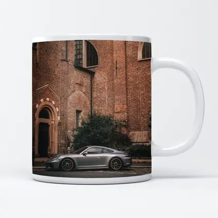 Porsche 911 GT3 Silver Beside Brick Church