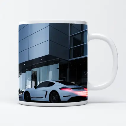 Porsche Cayman White Outside Modern Glass Building