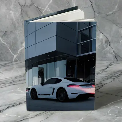 Porsche Cayman White Outside Modern Glass Building