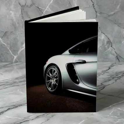 Porsche Cayman Silver Dark Studio Shot