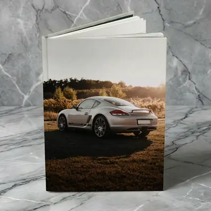 Porsche Cayman Silver Coupe Golden Hour Field