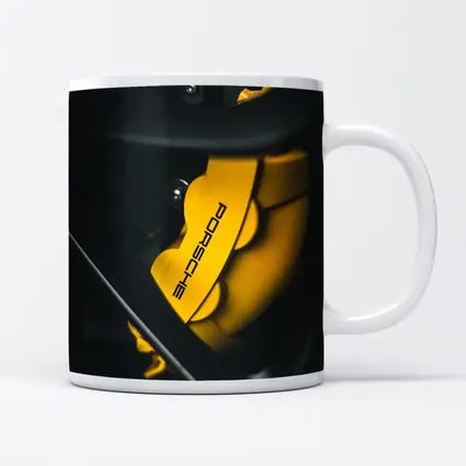 Porsche Yellow Brake Caliper Dark Background