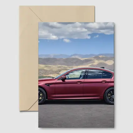 BMW M5 Matte Red Side Profile Mountains