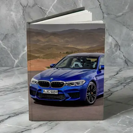 BMW M5 Blue Sedan Desert Mountains Background