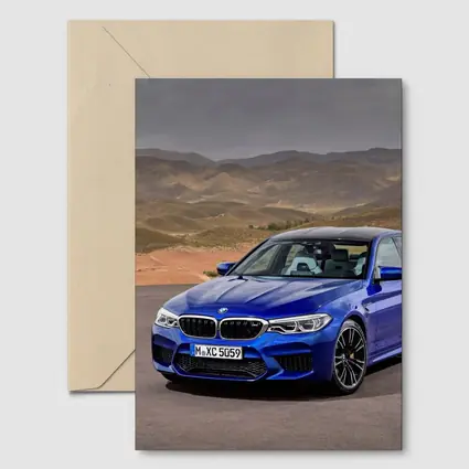 BMW M5 Blue Sedan Desert Mountains Background