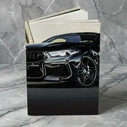 BMW M8 Manhart Black Coupe Urban Setting