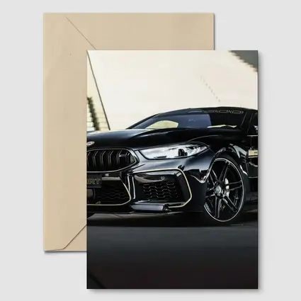 BMW M8 Manhart Black Coupe Urban Setting