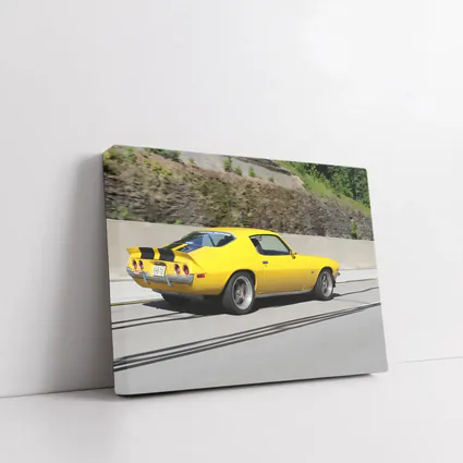 Yellow Chevrolet Camaro Z28 on Highway