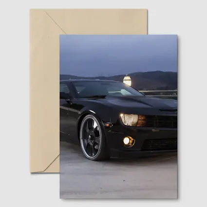 Black Chevrolet Camaro Parked at Dusk
