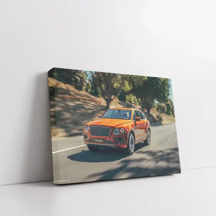Bentley Bentayga Hybrid Orange On Road