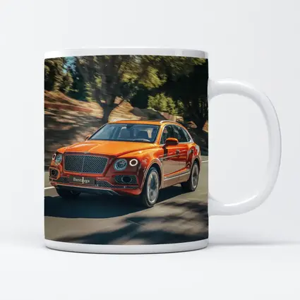 Bentley Bentayga Hybrid Orange On Road