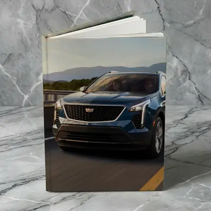 Cadillac XT4 SUV Driving Over Bridge