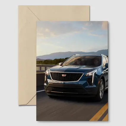 Cadillac XT4 SUV Driving Over Bridge