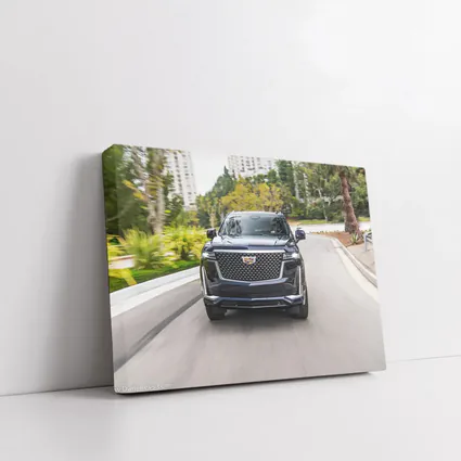 Cadillac Escalade Driving City Street Front View