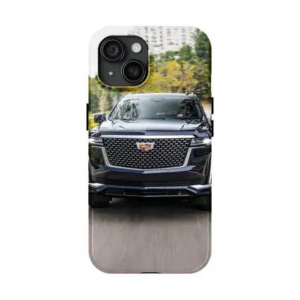 Cadillac Escalade Driving City Street Front View