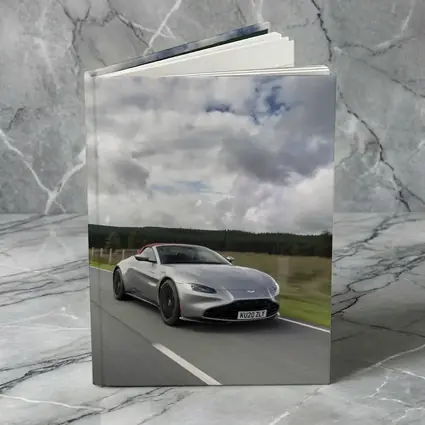 Aston Martin Vantage Roadster Silver Country Road
