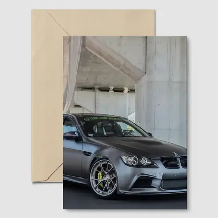 BMW M3 Sedan Matte Gray Under Concrete Bridge
