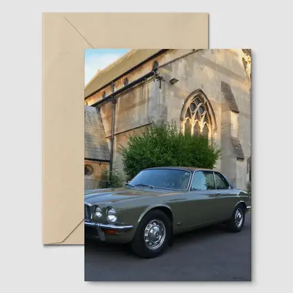 Classic Jaguar XJC Olive Green Church Background