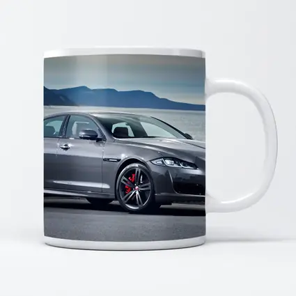 Jaguar XJ Gray Sedan Coastal Mountains Background