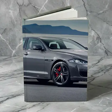 Jaguar XJ Gray Sedan Coastal Mountains Background