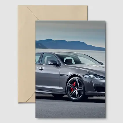 Jaguar XJ Gray Sedan Coastal Mountains Background