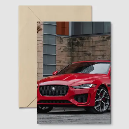 Jaguar XE Red Sedan Urban Building Background