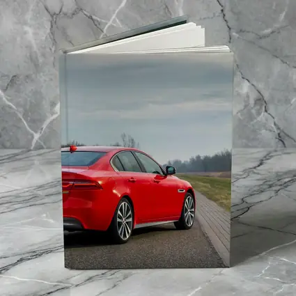 Jaguar XE Red Sedan Open Road