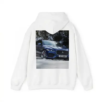 Jaguar XF Blue Sedan Driving Through Snow