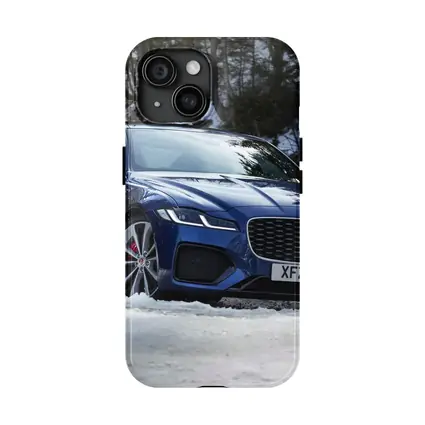 Jaguar XF Blue Sedan Driving Through Snow
