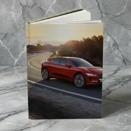 Jaguar I-Pace Red SUV Sunset Road