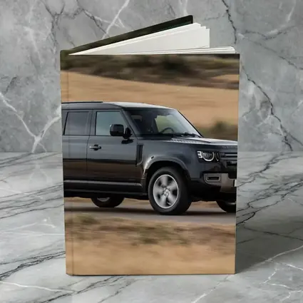 Land Rover Defender Driving Rural Road Scene