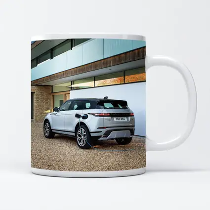Range Rover Evoque Charging At Modern House