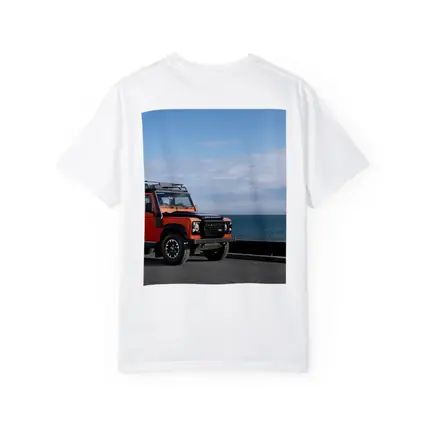 Land Rover Defender Orange Coastal Road Scene