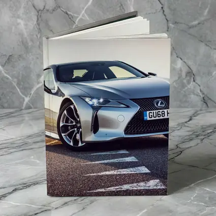 Lexus LC Silver Coupe On Track Road