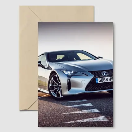 Lexus LC Silver Coupe On Track Road