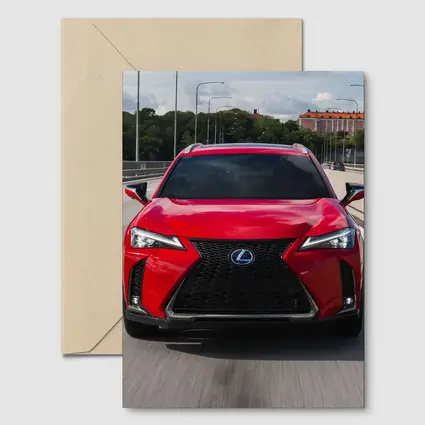 Lexus UX Red SUV On Urban Highway